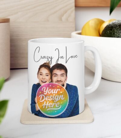 A white Customizable Photo Coffee Mug featuring a personalized couple portrait and a vibrant rainbow "Your Design Here" graphic placeholder.
