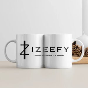A pristine white ceramic coffee mug with a glossy finish, personalized with elegant black text engraving. The 11oz capacity mug is displayed on a soft wooden surface in natural morning light, exuding warmth and the feeling of a meaningful gift ready to be cherished. IZEEFY Personalized Coffee Mug White.
