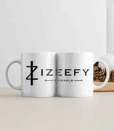 A pristine white ceramic coffee mug with a glossy finish, personalized with elegant black text engraving. The 11oz capacity mug is displayed on a soft wooden surface in natural morning light, exuding warmth and the feeling of a meaningful gift ready to be cherished. IZEEFY Personalized Coffee Mug White.