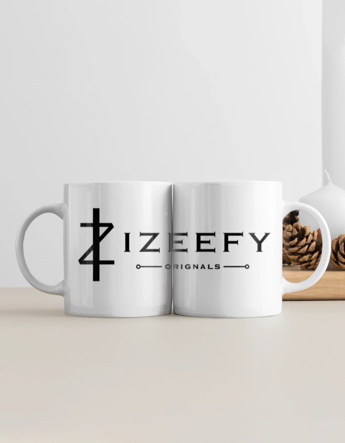 A pristine white ceramic coffee mug with a glossy finish, personalized with elegant black text engraving. The 11oz capacity mug is displayed on a soft wooden surface in natural morning light, exuding warmth and the feeling of a meaningful gift ready to be cherished. IZEEFY Personalized Coffee Mug White.